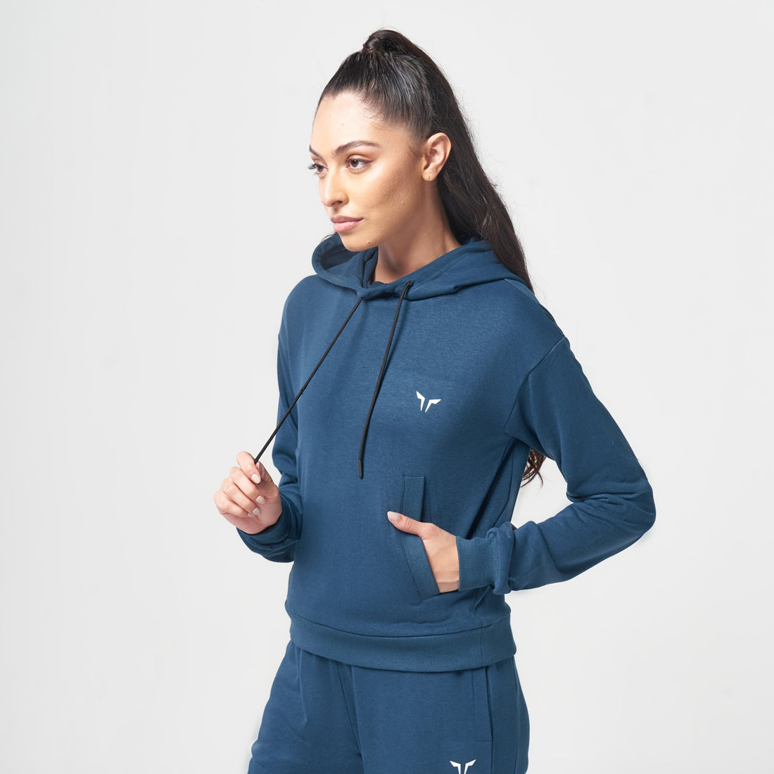ESSENTIAL WARM UP HOODIE - TEAL